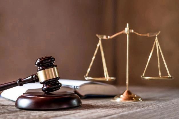Courtroom gavel and scales of justice
