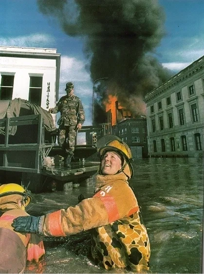 Firefighters and emergency responders at a disaster scene